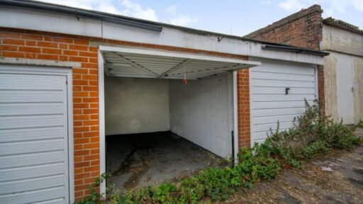 A garage in Clapham, London, is for sale at £140,000, reflecting the city's high costs. Located on Lavender Hill, it offers space for two cars and easy access to central London.