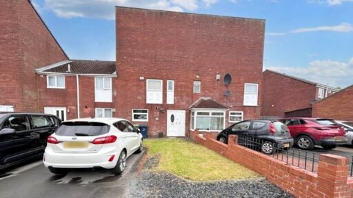 A three-bedroom house in Stanhope, near Newcastle, mocked for resembling Ant McPartlin's forehead, is on sale for £135,000. Spacious lounge, modern kitchen, and a backyard.