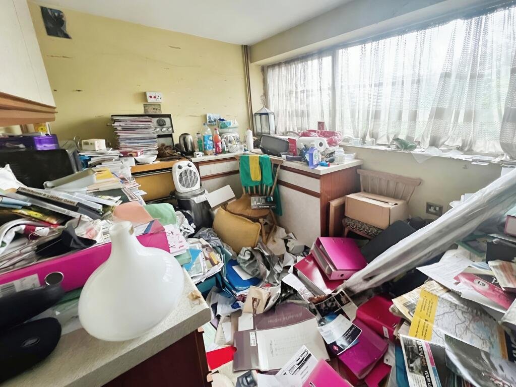 Three-storey house in Coventry for £80,000, filled with junk from a hoarder. Needs clearance and modernisation. Ideal investment opportunity. Auction on 11 July.
