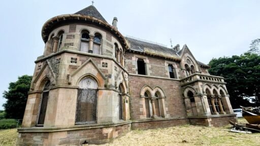 Historic French Gothic-style building, The Elms, designed by William Leiper, is up for auction at £350,000. Features stained glass windows and renovation potential in Arbroath.