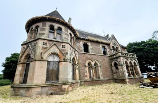 Historic French Gothic-style building, The Elms, designed by William Leiper, is up for auction at £350,000. Features stained glass windows and renovation potential in Arbroath.