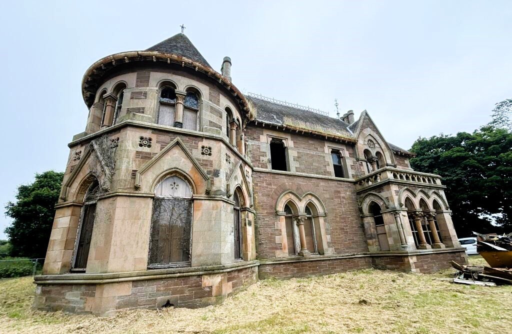 Historic French Gothic-style building, The Elms, designed by William Leiper, is up for auction at £350,000. Features stained glass windows and renovation potential in Arbroath.