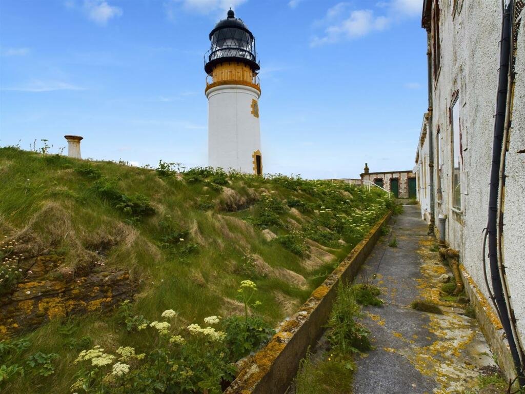 Own a piece of solitude on the uninhabited island of Copinsay with a 7-bedroom lighthouse for just £80,000. Includes quad bikes, sailing dinghy, solar panels, and helicopter pads.