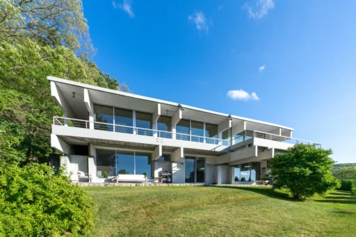 A luxury mansion, believed to have been owned by Sylvester Stallone, is for sale in New York for $4.29M. This 7,000 sq ft home features 180-degree Hudson River views and an indoor pool.