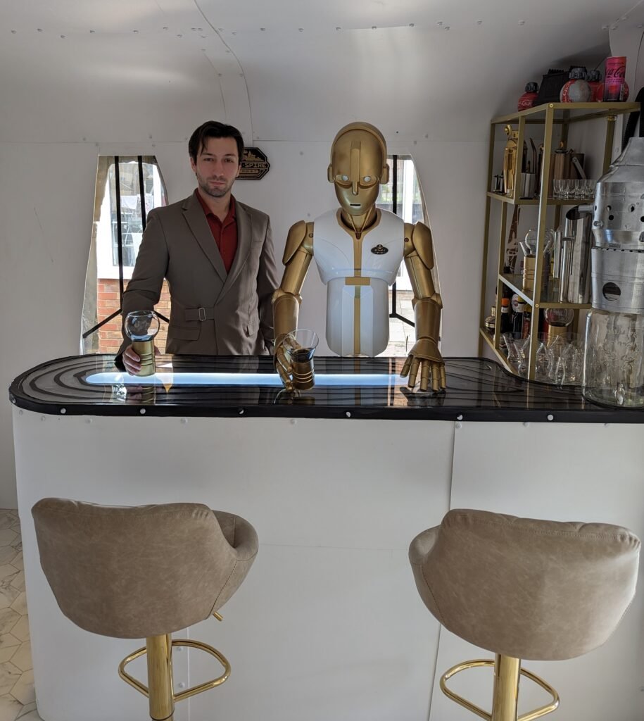 Sci-fi enthusiast Chester Walsh spent £10,000 to build a Star Wars-themed bar in his backyard, modeled after Mos Eisley Cantina, complete with a droid bartender and iconic decor.