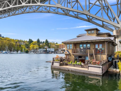 Stunning floating mansion "Aurora" on Lake Union, Seattle, hits the market for $3.9 million. This 4,850 sq ft luxury home boasts three bedrooms, gourmet kitchen, and incredible views.