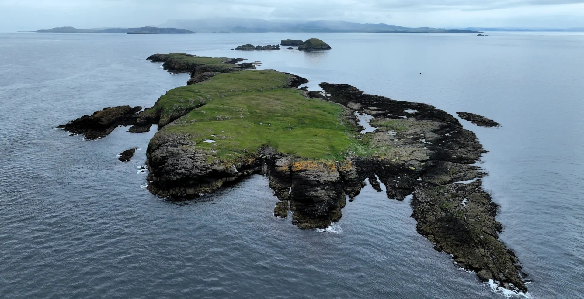 Magical Fladda-Chuain island off Skye's coast is for sale at £190,000. Uninhabited and pristine, this 69.99-acre island features stunning views, wildlife, and ancient shipwrecks.