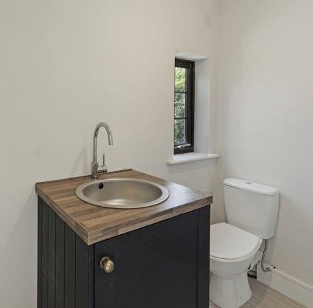 Newly refurbished £400,000 family home in Paddock Wood features a quirky, cramped WC setup, leaving potential buyers puzzled despite its spacious garden and modern updates.