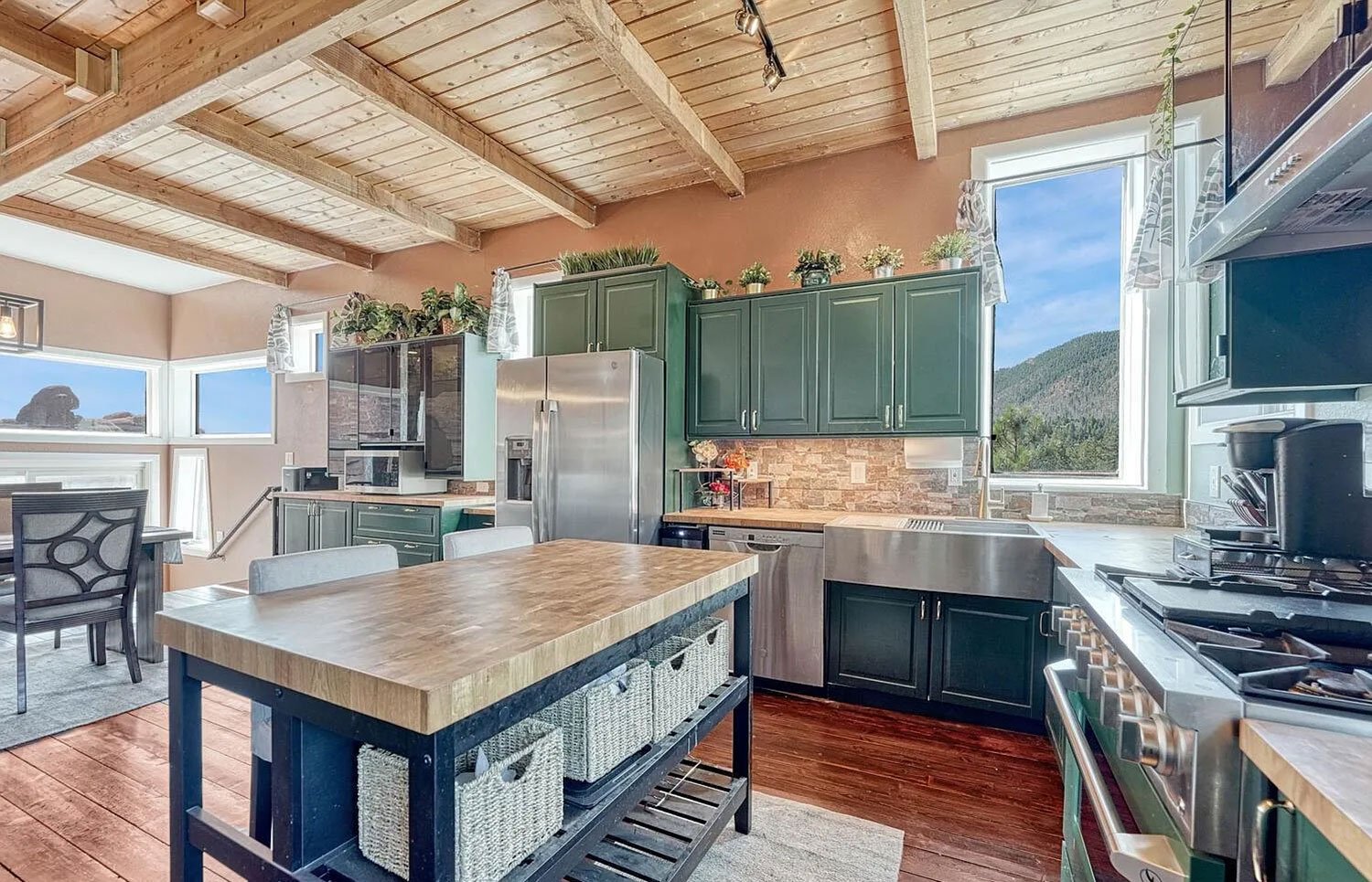 Home built into 200-million-year-old rock face on market for $1m ...