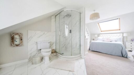 A £550,000 home in Saffron Walden, Essex, features a unique open-plan en-suite in the master bedroom, raising hygiene concerns and sparking curiosity. Discover the quirky design!