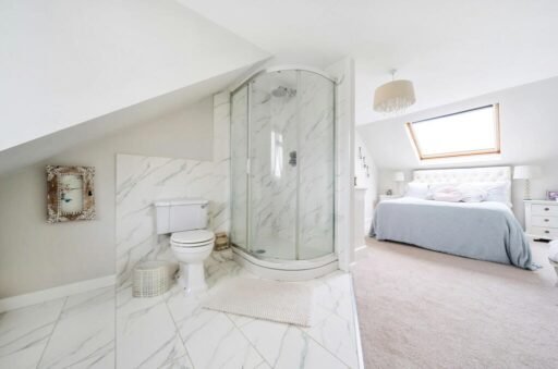 A £550,000 home in Saffron Walden, Essex, features a unique open-plan en-suite in the master bedroom, raising hygiene concerns and sparking curiosity. Discover the quirky design!