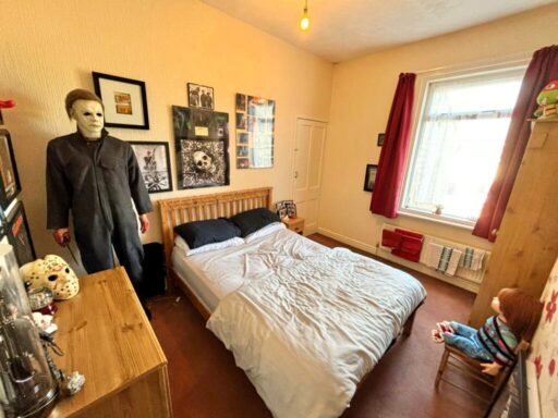 House hunters stunned by a two-bedroom Blackpool home featuring a chilling horror movie theme, complete with life-size statues and eerie decor, listed for just £77,500.