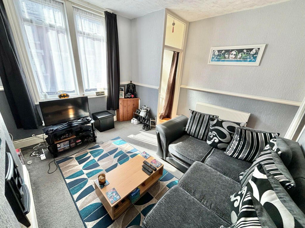 House hunters stunned by a two-bedroom Blackpool home featuring a chilling horror movie theme, complete with life-size statues and eerie decor, listed for just £77,500.