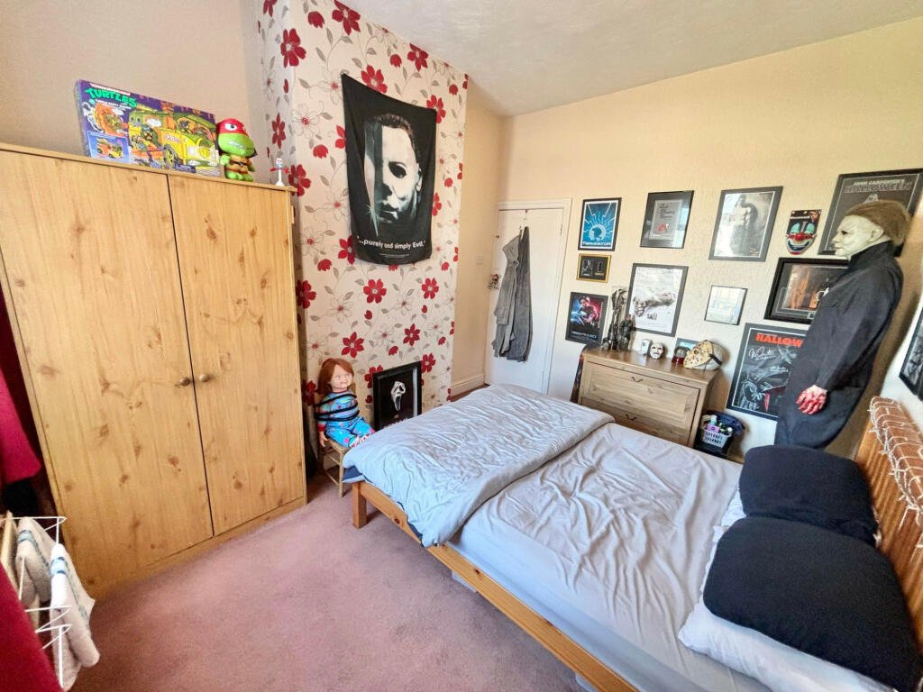 House hunters stunned by a two-bedroom Blackpool home featuring a chilling horror movie theme, complete with life-size statues and eerie decor, listed for just £77,500.