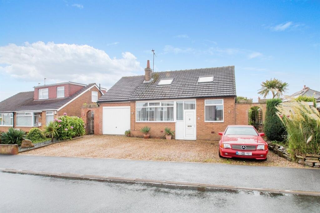 Quirky £360,000 bungalow in Leeds features a pink bedroom with a toilet just inches from the bed, sparking curiosity. A unique find with four bedrooms and open-plan living.