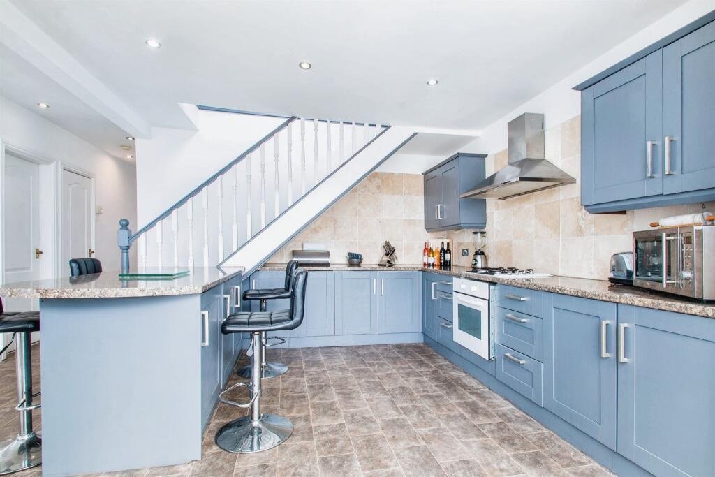 Quirky £360,000 bungalow in Leeds features a pink bedroom with a toilet just inches from the bed, sparking curiosity. A unique find with four bedrooms and open-plan living.