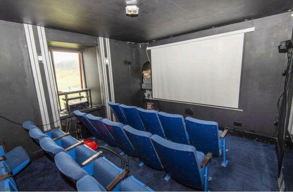 A secluded former schoolhouse on the Shetland Islands is up for auction at £80,000. Accessible only by ferry, this unique home features a private cinema and indoor spa.