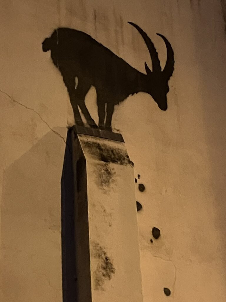 Banksy's new artwork on a building in Richmond, London, could double the property’s value, adding £500-£800k. The goat-themed piece has fans and experts buzzing about its impact.