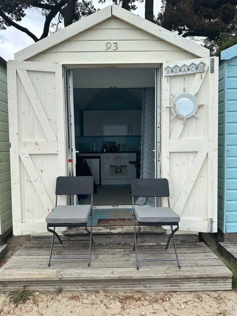 Tiny beach hut on Avon Beach, Dorset, hits the market for £110,000. With no bathroom but ocean views and a prime Location, it's a pricey yet convenient seaside retreat.