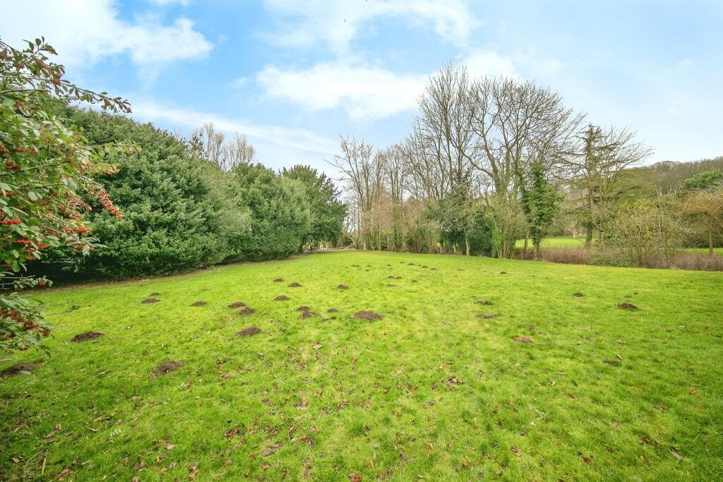 Discover a hidden gem in Suffolk: a Grade-II listed maisonette with stunning arches, priced at £135,000. Needs renovation due to flooding, but ideal for DIY enthusiasts.