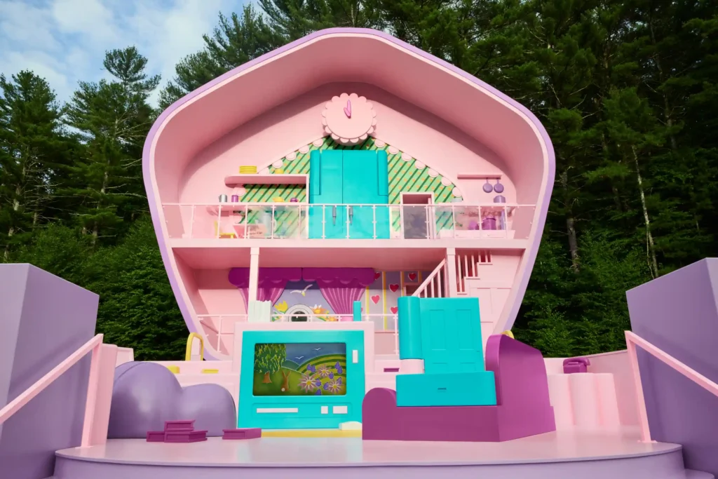 Relive 90s nostalgia in a life-sized Polly Pocket house in Littleton, MA. Enjoy iconic fashion, vintage accessories, and retro snacks. Book your stay on Airbnb from August 21!