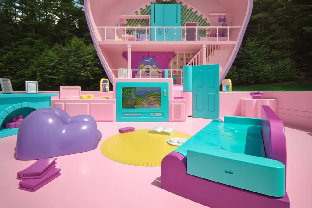 Relive 90s nostalgia in a life-sized Polly Pocket house in Littleton, MA. Enjoy iconic fashion, vintage accessories, and retro snacks. Book your stay on Airbnb from August 21!