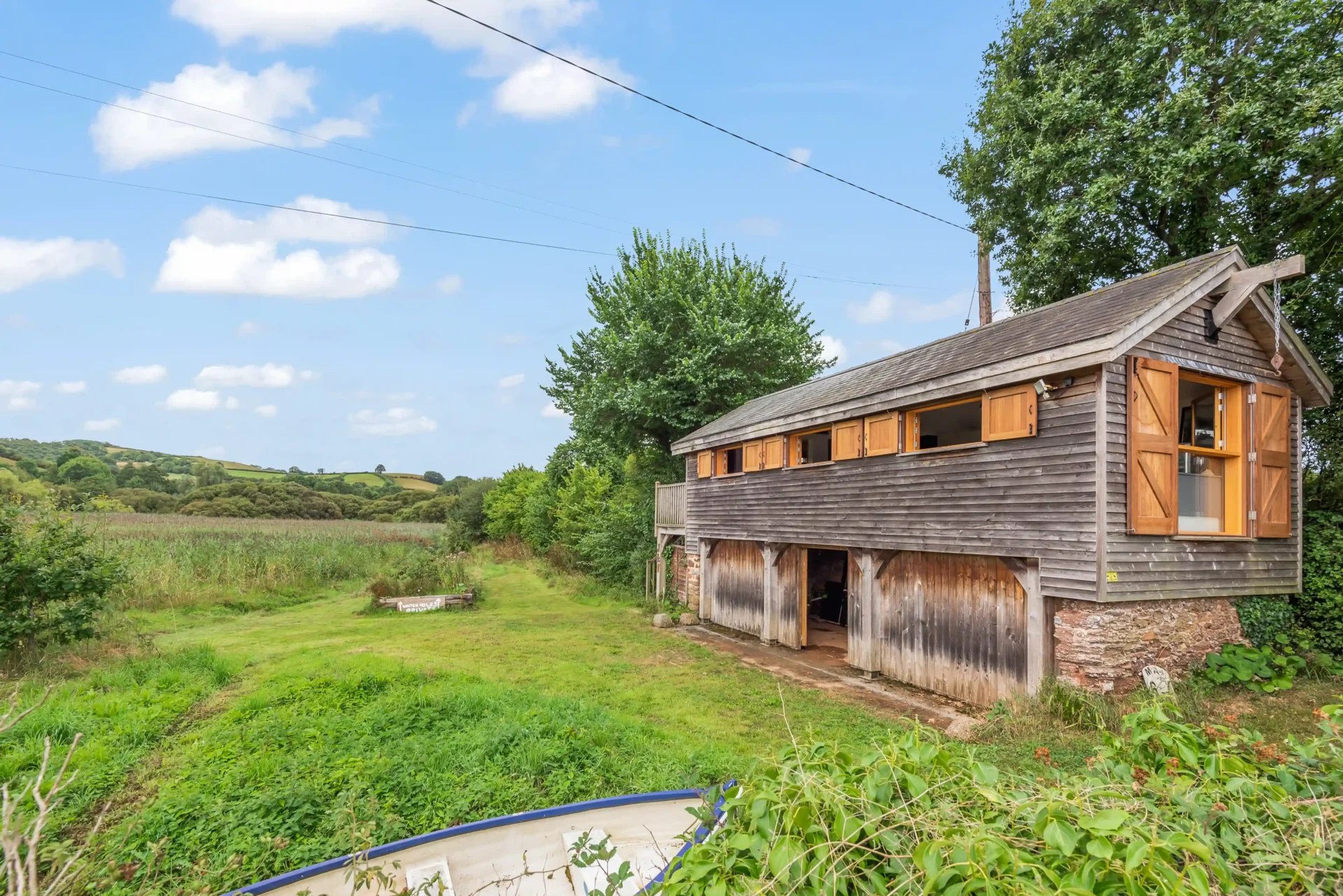 Britain’s most expensive bird hide, featuring a shower and hot water, is on sale for £135,000. Set in 1.4 acres of marshland with stunning river views, perfect for wildlife enthusiasts.