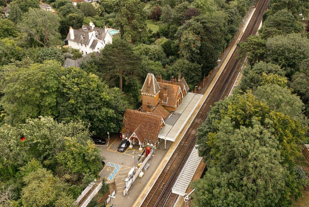 Commuter's dream home for £850,000: A charming 4-bed property attached to a train station with direct links to London. Historic charm meets modern convenience in Dorking.