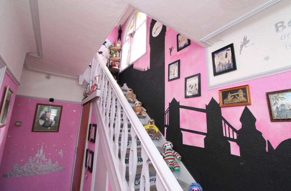 Disney-themed home in Rhyl hits the market for £179,950. Featuring Aladdin murals, Peter Pan stairway, and toy-filled rooms, this unique property is perfect for Disney fans.