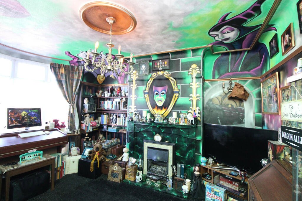 Disney-themed home in Rhyl hits the market for £179,950. Featuring Aladdin murals, Peter Pan stairway, and toy-filled rooms, this unique property is perfect for Disney fans.