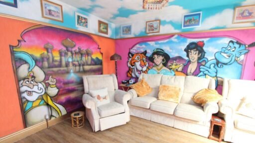 Disney-themed home in Rhyl hits the market for £179,950. Featuring Aladdin murals, Peter Pan stairway, and toy-filled rooms, this unique property is perfect for Disney fans.