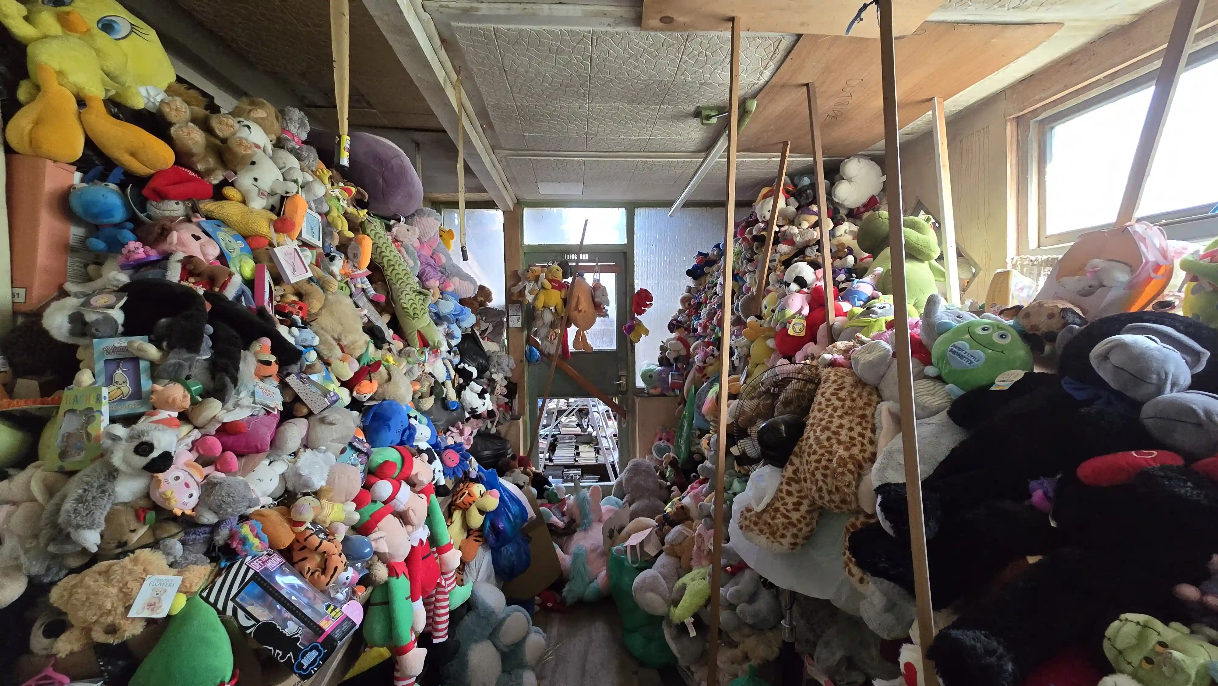 Urban explorer discovers abandoned Liverpool home filled with 10,000 vintage toys worth £100,000 - a hoarder's treasure trove of stuffed animals and collectibles.