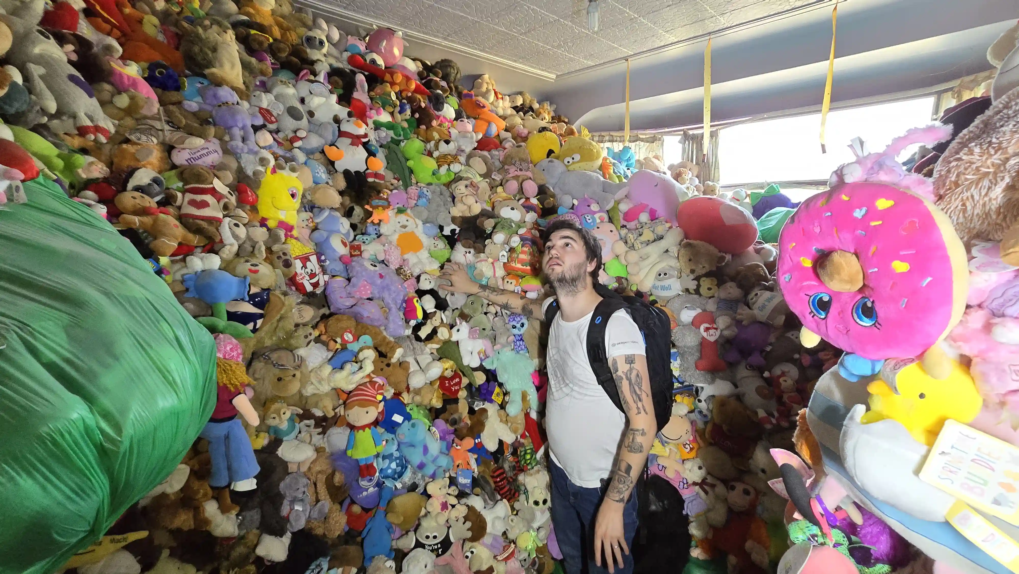 Urban explorer discovers abandoned Liverpool home filled with 10,000 vintage toys worth £100,000 - a hoarder's treasure trove of stuffed animals and collectibles.