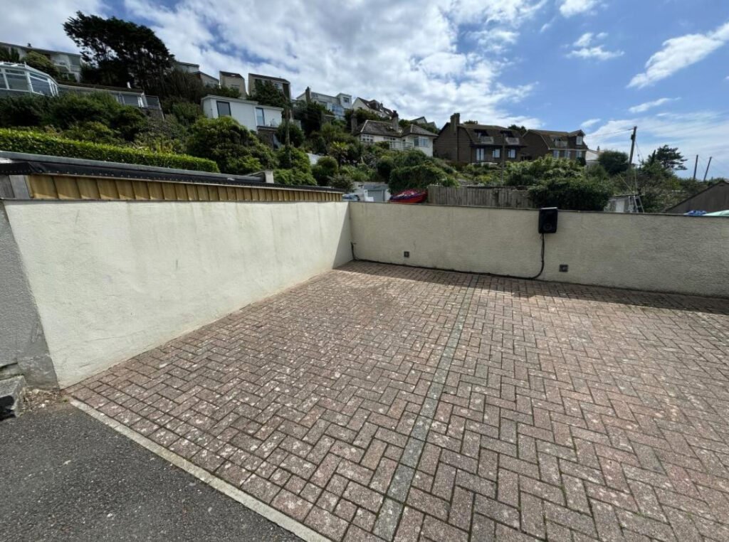 A former WWII bomb shelter with stunning sea views in Downderry, Cornwall is up for auction for just £25,000—perfect for a workshop or storage space.