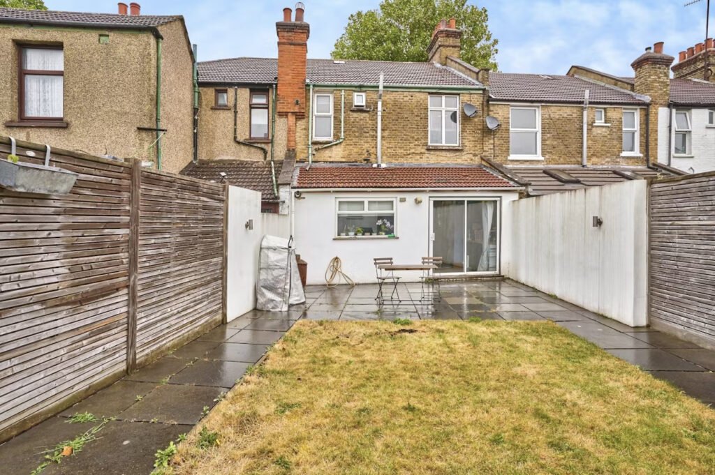 Discover an Oasis fan's dream home in Abbey Wood! This stunning three-bedroom terrace, inspired by the Definitely Maybe album, is on the market for £550,000.