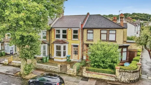 Discover an Oasis fan's dream home in Abbey Wood! This stunning three-bedroom terrace, inspired by the Definitely Maybe album, is on the market for £550,000.