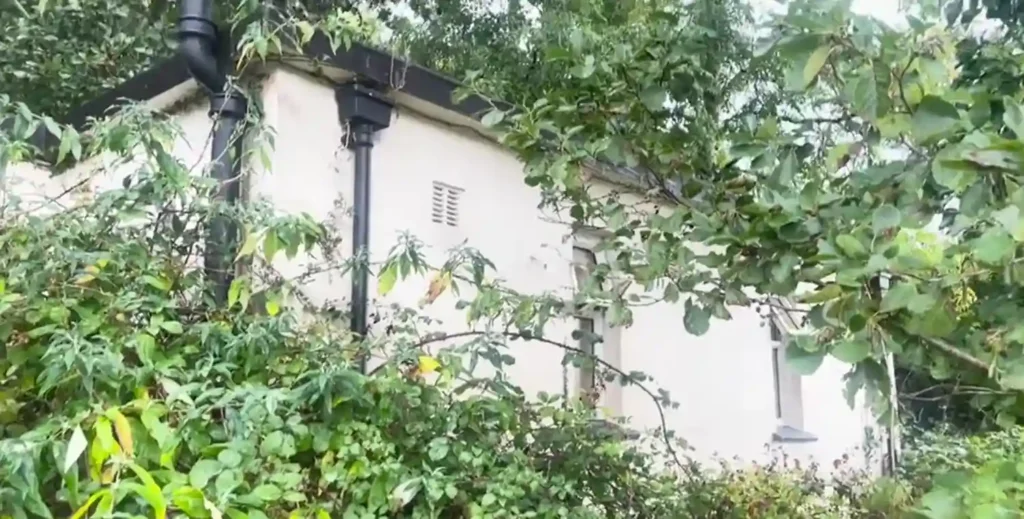 A disused riverside toilet block with stunning views over the River Fal in Malpas, Cornwall, is up for auction at £30,000, offering a unique renovation opportunity despite its quirky past.