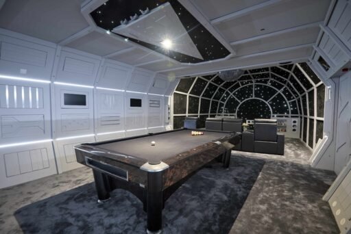 A stunning 5-bedroom home in Rawdon, near Leeds, features a Star Wars-themed cinema room with a Millennium Falcon replica. Listed at £1.75M, it's a dream for film fans and luxury seekers.