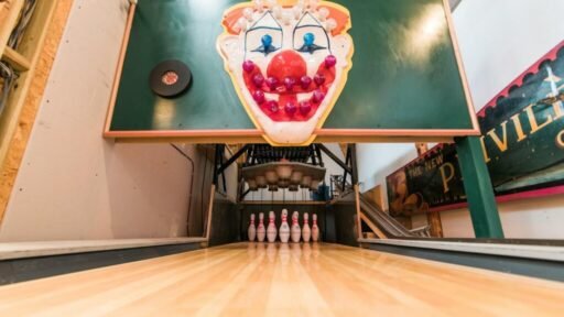 Victorian bathhouse turned quirky family home hits the market for £1.1M, featuring circus-themed décor, a bowling alley, cinema room, and sun terrace in East Sussex.