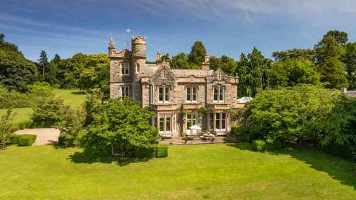 A fairy tale-like castle, Elmfield, built in 1850, is on the market for £3.35M. Nestled in Northern Ireland, this 90-acre estate offers historic charm and modern luxury.