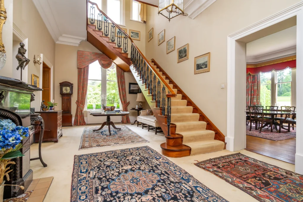 A fairy tale-like castle, Elmfield, built in 1850, is on the market for £3.35M. Nestled in Northern Ireland, this 90-acre estate offers historic charm and modern luxury.