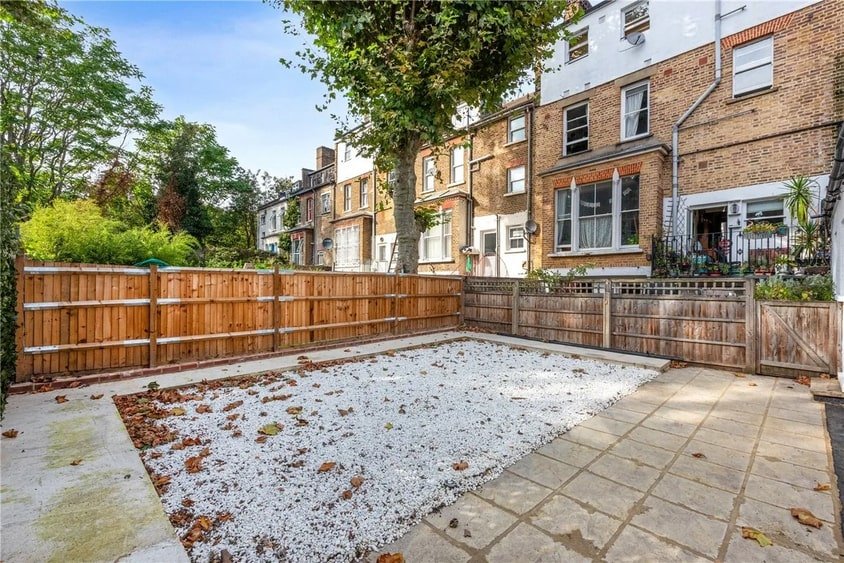 A tiny one-bedroom flat in Hackney, likened to a "shed," has gone viral after being listed for £525,000, stunning viewers with its small size compared to neighboring homes.