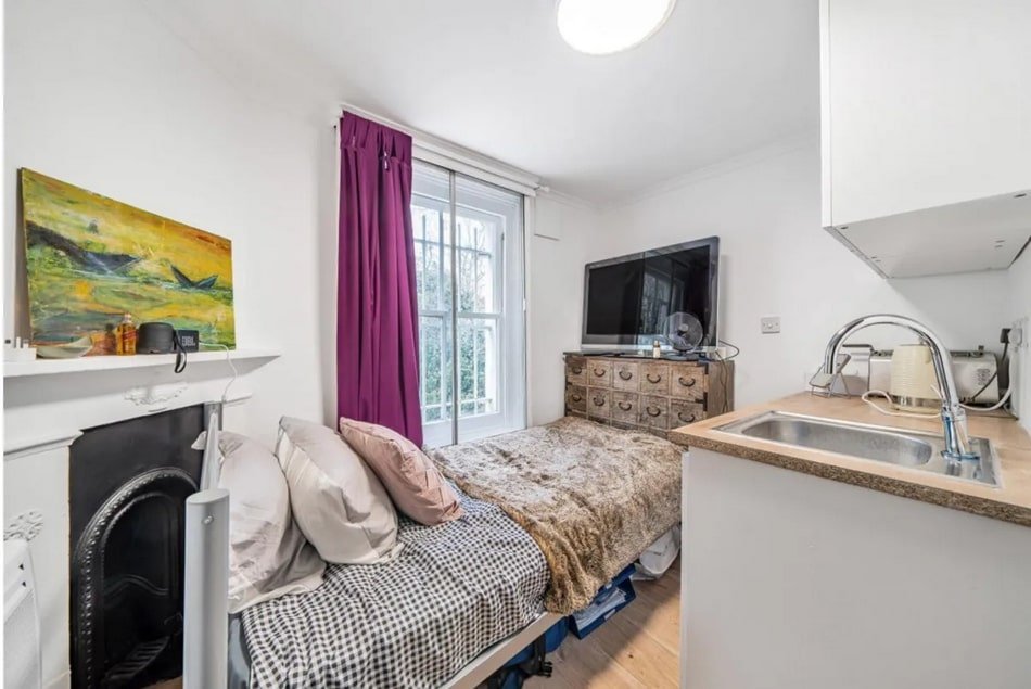 Tiny one-bed flat in London listed for £100,000 raises eyebrows for its compact 9.75m² size, marketed as 'ideal for couples' despite only fitting a single bed. Cash buyers only.