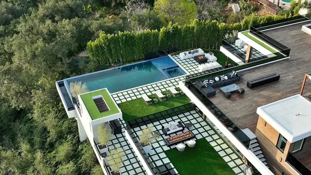 Luxury Brentwood estate "The Oasis" offers 20,000 sq ft of opulence with a Kobe Bryant-themed basketball court, car showroom, aquarium, and more, for $250K/month.