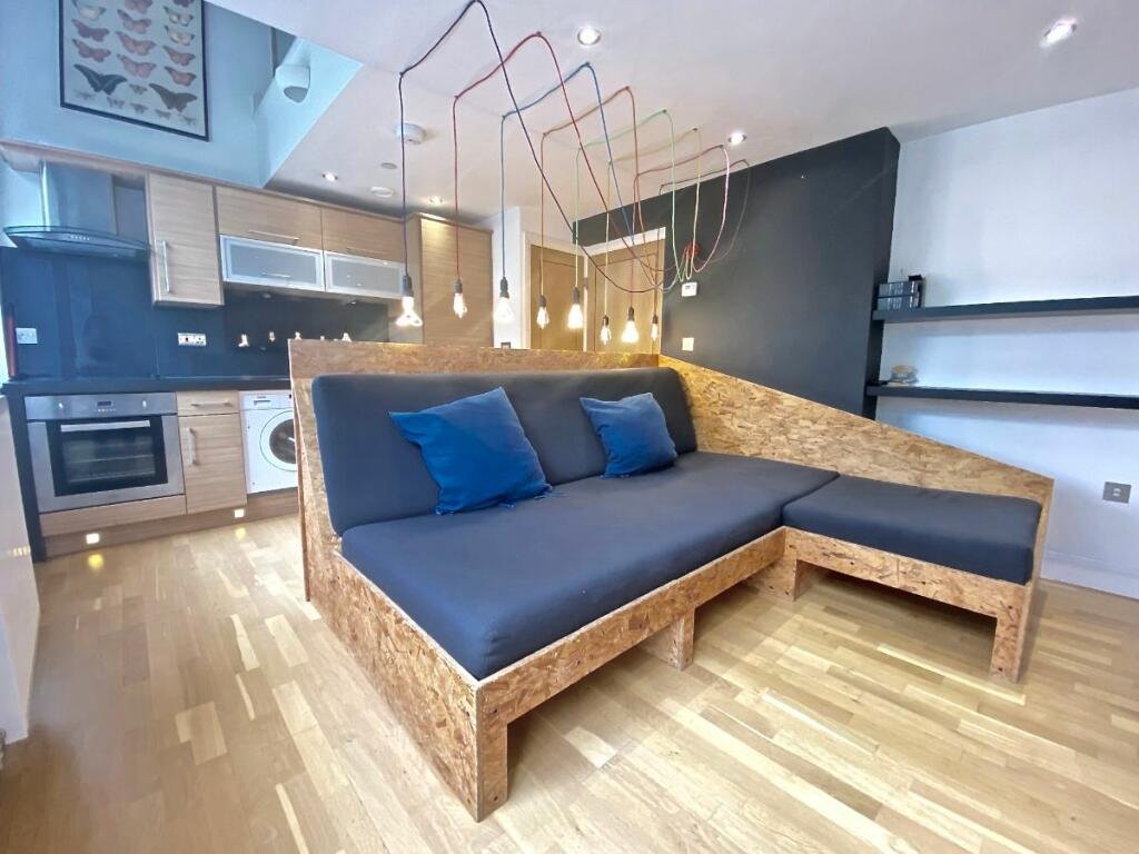 Unique Sheffield apartment with waterside views available for £725/month! Historic charm meets modern living, but watch out for the quirky low beam in the bedroom!