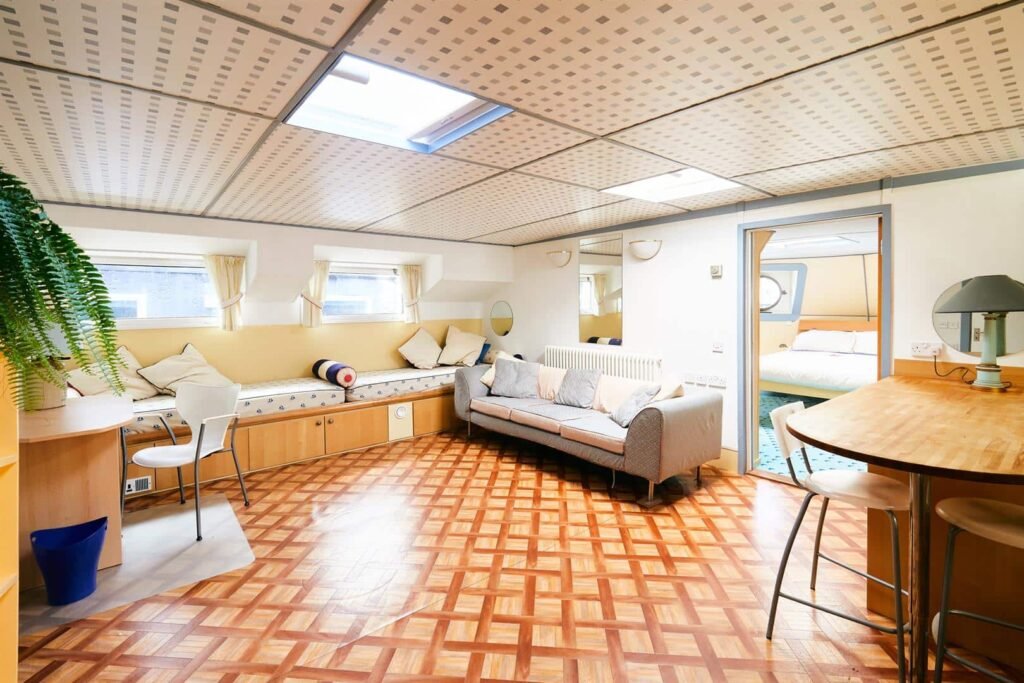 Luxury 5-bedroom houseboat with fireplace, 3 open decks, and stunning Thames views hits the market in London for £1.8m. Moored at Prospect Quay, it's a unique riverside gem.