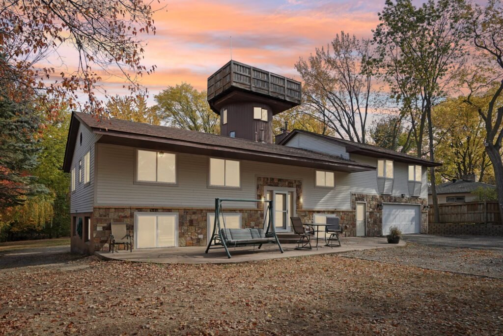 Unique home of Rollerblade inventor Scott Olson hits the market in Minnesota for $599K, featuring a star-gazing silo, mini sports court, and scenic creek views.