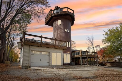 Unique home of Rollerblade inventor Scott Olson hits the market in Minnesota for $599K, featuring a star-gazing silo, mini sports court, and scenic creek views.