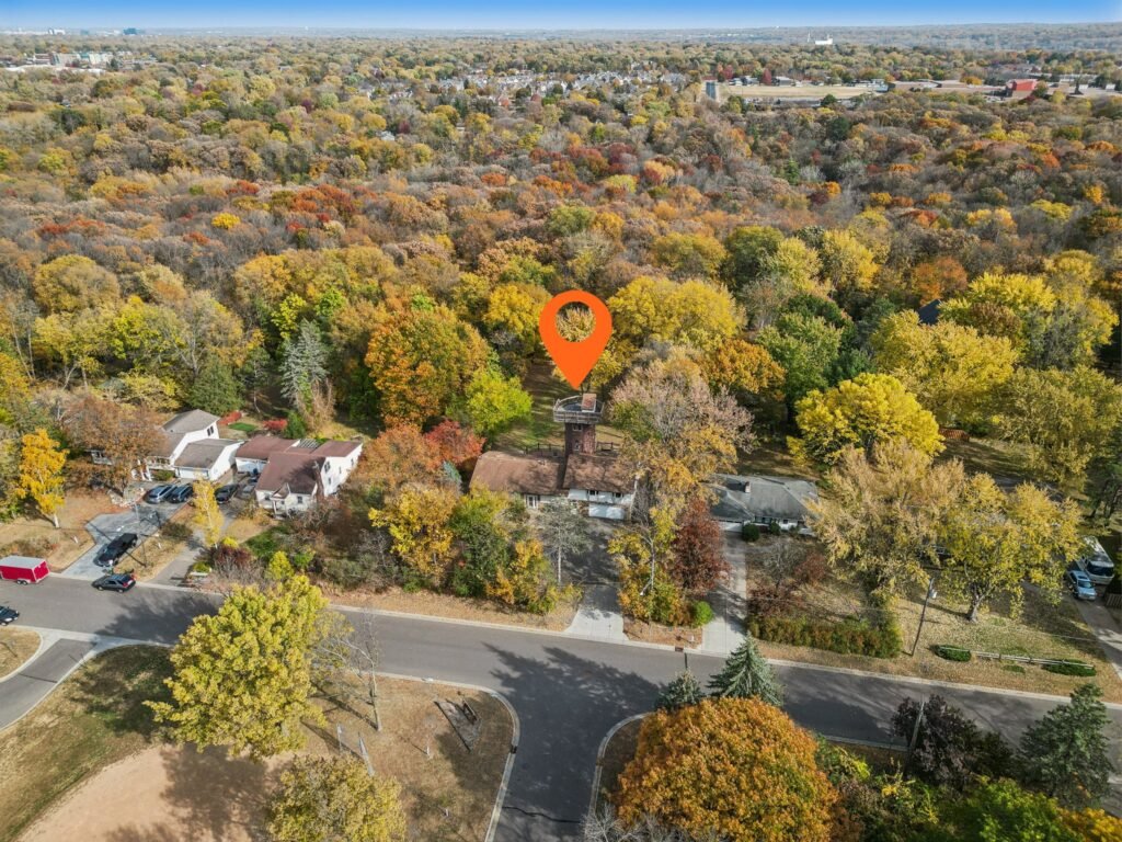 Unique home of Rollerblade inventor Scott Olson hits the market in Minnesota for $599K, featuring a star-gazing silo, mini sports court, and scenic creek views.