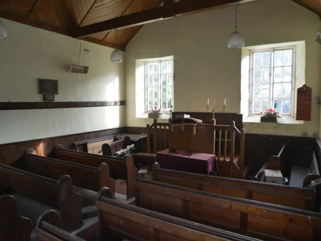 Charming former chapel in Brecon Beacons National Park for sale at £70,000. Nestled in scenic Honddu Valley, this 418 sq ft property offers unique rural retreat potential.